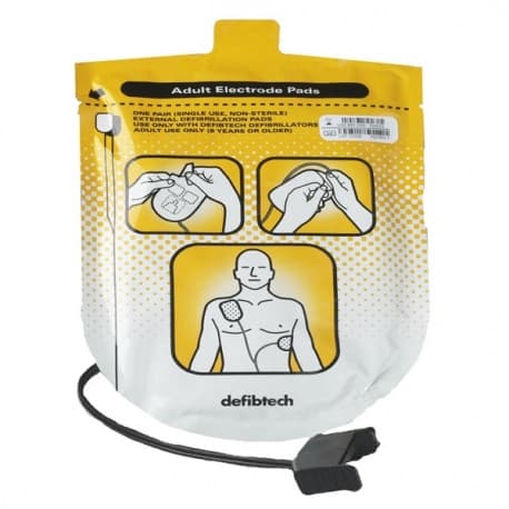 Paire d'électrodes adultes Defibtech Lifeline DDP-100 sous emballage jaune, avec câble et connecteur de défibrillation.