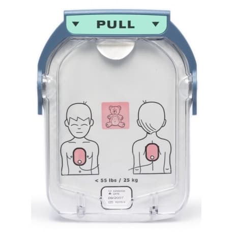 Cartouche d'électrodes pédiatriques Philips HeartStart HS1 M5072A, avec illustrations de positionnement sur un enfant.