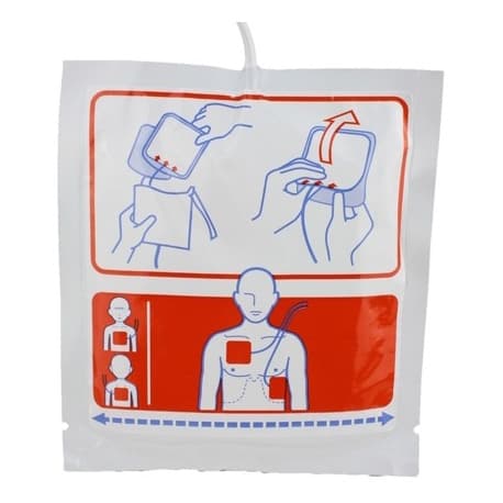 Emballage d'électrodes de défibrillation Nihon Kohden AED-2100 avec illustrations de préparation et de positionnement sur le thorax.